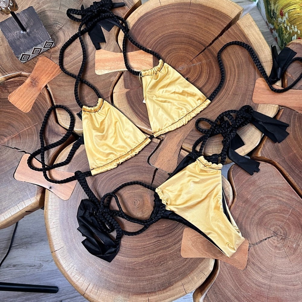 Lola love affair, gold, and black bikini. - Picture 9 of 10